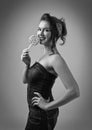 Black and white portrait of beautiful woman with Lollipop . Royalty Free Stock Photo