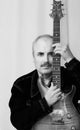Black and white portrait of a Caucasian guitarist Royalty Free Stock Photo