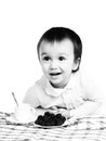 Black-and-white portrait of girl at the table Royalty Free Stock Photo