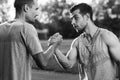 Black and white portrait of handsome men with arm wrestling Royalty Free Stock Photo