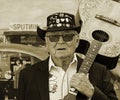 Black and white portrait of Knut T. Storbukas the Legend Norwegian singer holding his guitar Royalty Free Stock Photo