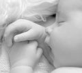 A black and white portrait, macro shot. Mom and her baby. The concept of a happy family. Beautiful conceptual image of motherhood Royalty Free Stock Photo