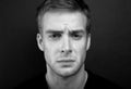 Black and white portrait photo of young sad man Royalty Free Stock Photo