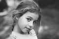 Black and white Portrait of smiling cute little girl at summer park. Happy child looking at the camera Royalty Free Stock Photo