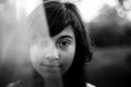 Black and white portrait of teen girl with expressive eyes, in the countryside Royalty Free Stock Photo