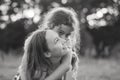 Black and white portrait of Two Happy little girls laughing and hugging at the  summer park Royalty Free Stock Photo