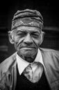 Black and White portraiture of a middle-aged Asian Man smiling at the camera Royalty Free Stock Photo