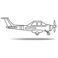 Black and white propeller aircraft landing on smooth shadow Royalty Free Stock Photo