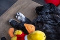 Black and white puppy sleeps with a toy Royalty Free Stock Photo