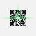 A black-and-white QR code is displayed on a light background with a green laser bea Royalty Free Stock Photo