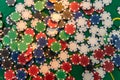 Black white red blue green casino chips stacks on green poker table. Betting club and gamble Royalty Free Stock Photo