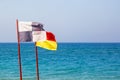 Information flags on the sea beach Royalty Free Stock Photo