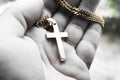 Black & White Religious Cross In Palm Of Hand High Quality