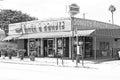 Black & White rendering of a facade of a Donuts & Pizza Shop located downtown Wilmington, California .