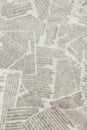 Black and white repeating torn newspaper background. Continuous pattern left, right, up and down Royalty Free Stock Photo