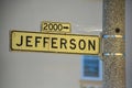 Black and white road sign on street lamp that say Jefferson in historic districts of downtown san francisco california Royalty Free Stock Photo