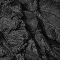 Black white rock texture. Cracked mountain surface. Close-up. Dark gray stone grunge background. Royalty Free Stock Photo