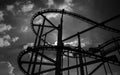 Black and white rollercoaster track in amusement park. Royalty Free Stock Photo