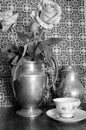 black & white roses in antique silver pitcher, teacup, saucer TEATIME