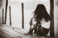 Black and white of Sad and lonely woman sitting alone Royalty Free Stock Photo