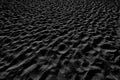 Black and White Sand beach macro photography. Texture of black and whote sand for background. Close-up macro view of volcanic sand Royalty Free Stock Photo