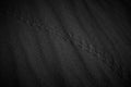 Black and White Sand beach macro photography. Texture of black and whote sand for background. Close-up macro view of volcanic sand