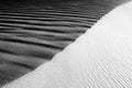 Black and White Sand beach macro photography. Texture of black and whote sand for background. Close-up macro view of volcanic sand Royalty Free Stock Photo