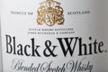 Black and White Scotch Whisky bottle closeup