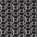 Black and white seamless tile of interconnected circles with metallic gradients Royalty Free Stock Photo