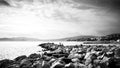 Black and white seascape of cannes rocky beach