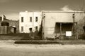 black white sepia deserted town industrial war abandoned closed shut run-down buildings