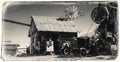 Black and White Sepia Vintage Photo of Jerome Gold King Mine & Ghost Town with old western building