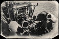 Black and White Sepia Vintage Photo of Old Rusted Car in a junkyard Royalty Free Stock Photo