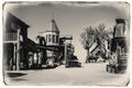 Black and White Sepia Vintage Photo of Old Western Wooden Buildings in Goldfield Gold Mine Ghost Town