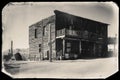 Black and White Sepia Vintage Photo of Old Western Wooden Buildings in Goldfield Gold Mine Ghost Town Royalty Free Stock Photo