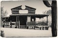 Black and White Sepia Vintage Photo of Old Western Wooden Bulding in Goldfield Gold Mine Ghost Town in Youngsberg