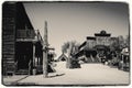 Black and White Sepia Vintage Photo of Old Western Wooden Bulding in Goldfield Gold Mine Ghost Town in Youngsberg Royalty Free Stock Photo