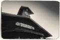 Black and White Sepia Vintage Photo of Old Western Wooden Railway Station in Goldfield Gold Mine Ghost Town