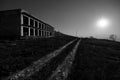 Black and white shot of an abandoned unfinished building