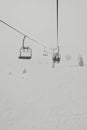 black and white shot of chairlift in the winter Royalty Free Stock Photo