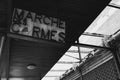 Black and white shot of the destroyed sign of the Carmelite market in Toulouse, France