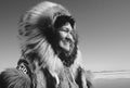 Black and white photo of Eskimo woman wearing traditional clothing