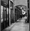 A black and white shot of a male shopper outside Links of London Covent Garden, London UK Royalty Free Stock Photo