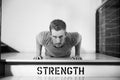 Black And White Shot Of Man In Gym Doing Press-Ups Royalty Free Stock Photo