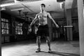 Black And White Shot Of Man In Gym Lifting Weights Royalty Free Stock Photo