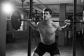 Black And White Shot Of Man In Gym Lifting Weights Royalty Free Stock Photo