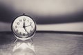Black and white shot of a vintage and retro clock Royalty Free Stock Photo
