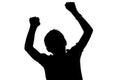 Black and white silhouette of a boy cheering