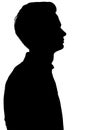 Black and white silhouette of an guy thoughtfully looking up,young man face profile