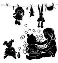 Silhouette little girl washes toys